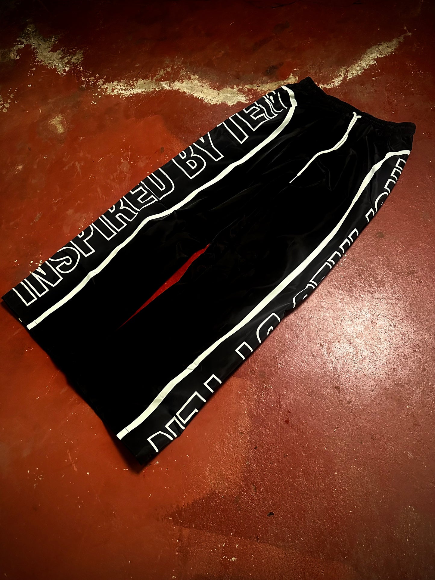 INSPIRED BY TEN BLACK TRACK PANTS