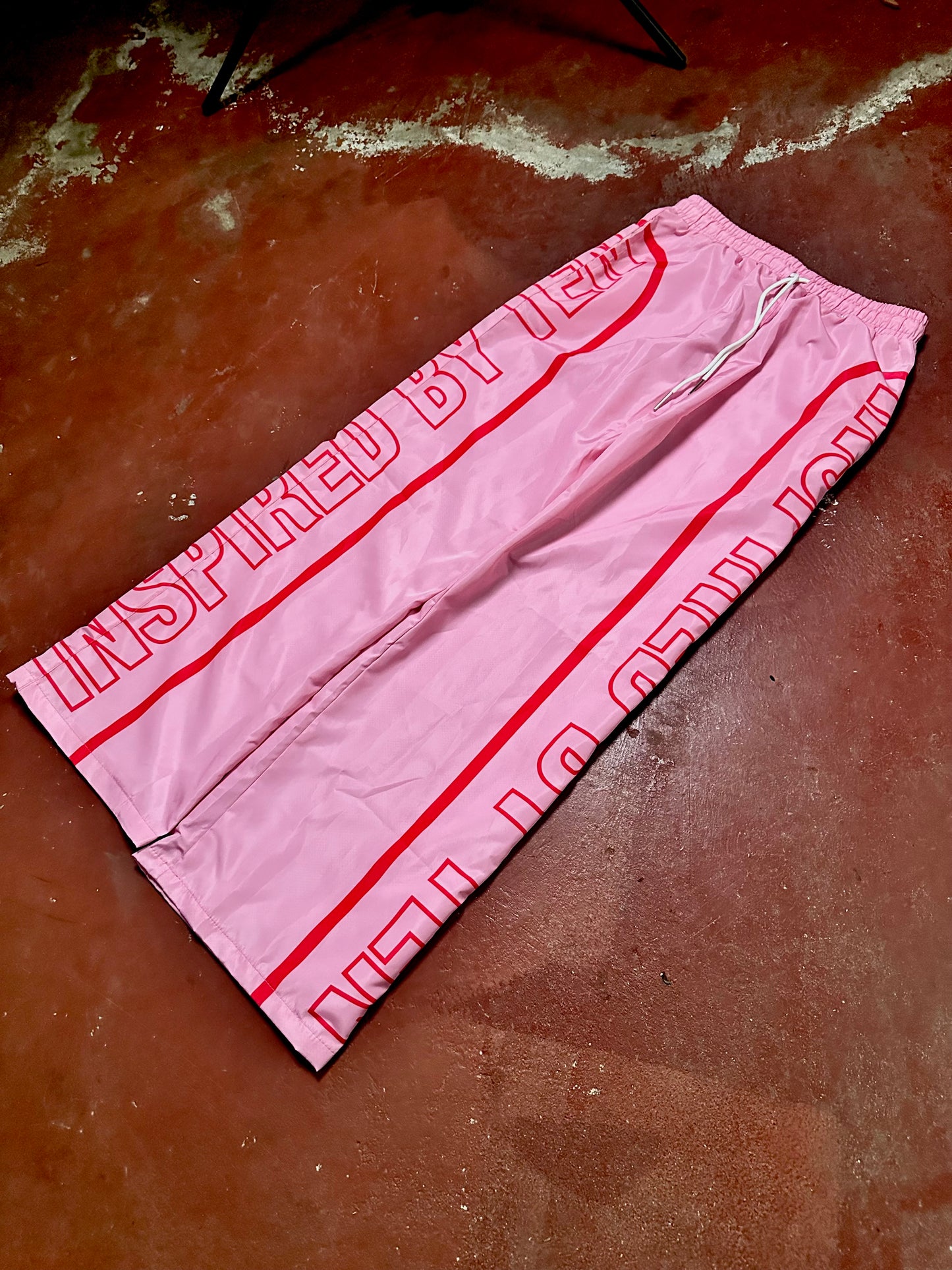 INSPIRED BY TEN PINK TRACK PANTS